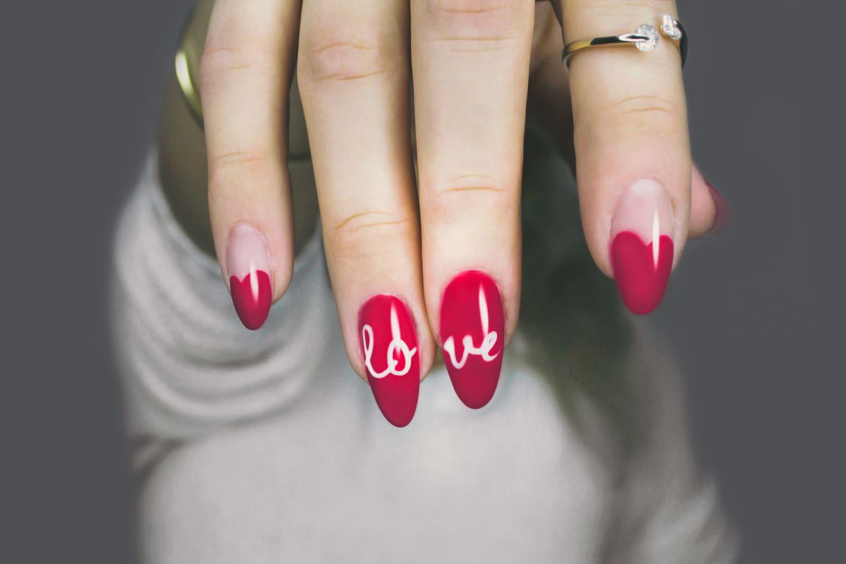 Custom hand-painted nail art at Elite Nails